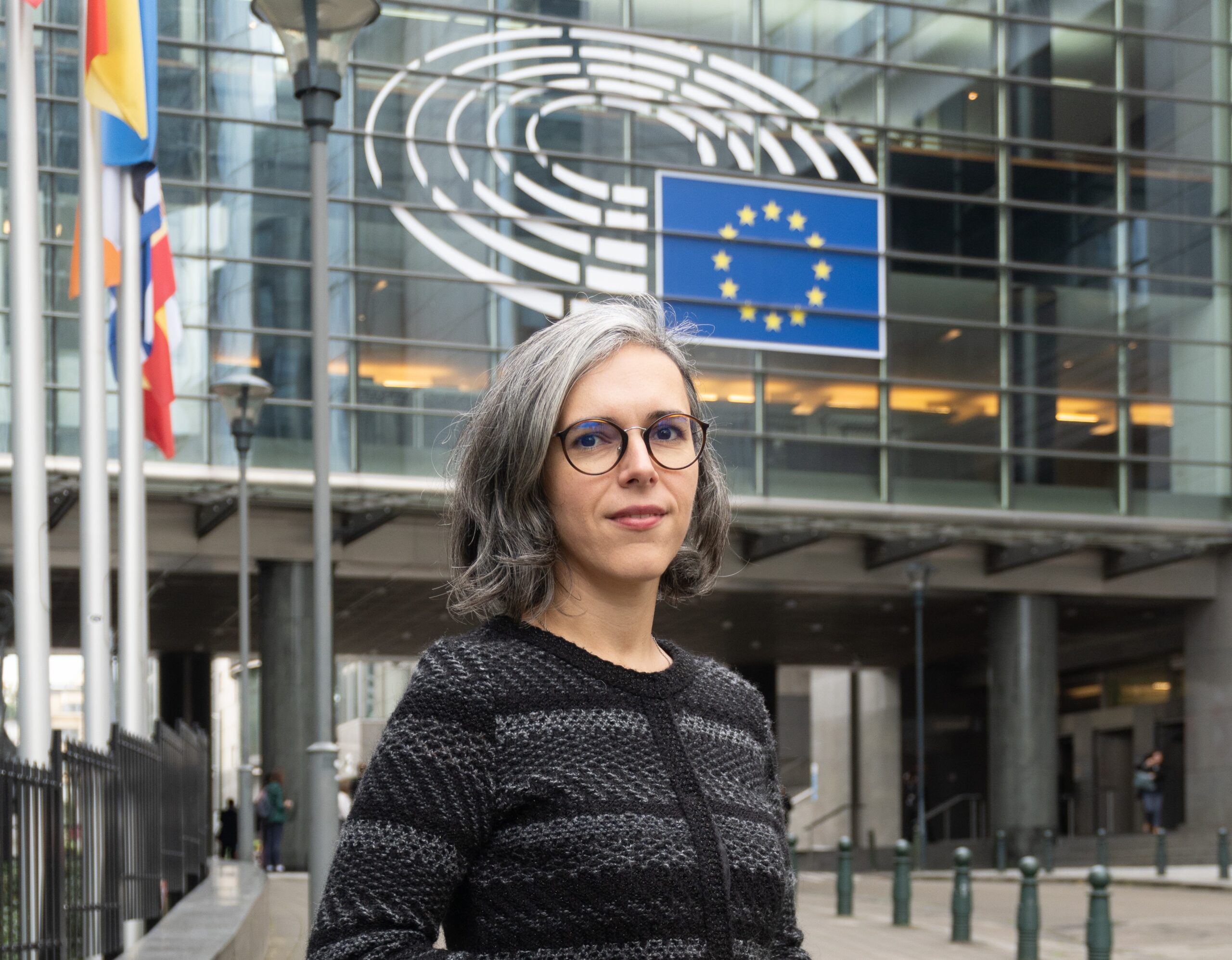 Adina Portaru before the European Parliament where climate change was blamed for the slaughter of Christians