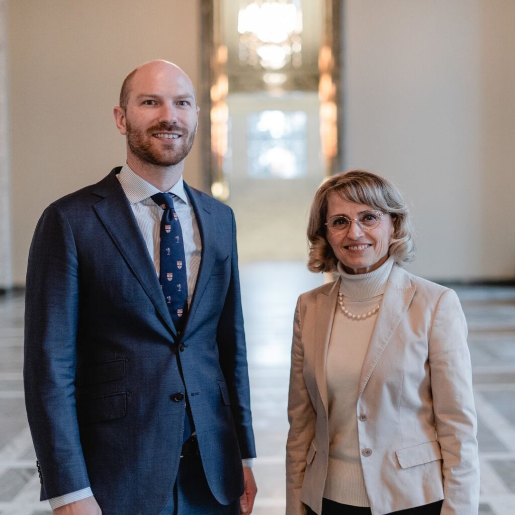 Paul Coleman and Päivi Räsänen stand together. She will face trial at the Finnish Supreme Court.
