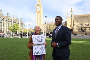 Livia and Jeremiah stand before Big Ben.